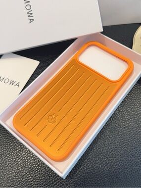RIMOWA Orange Ribbed Phone Case iPhone 17 pro max
